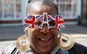 lady with union jack flags over her eyes