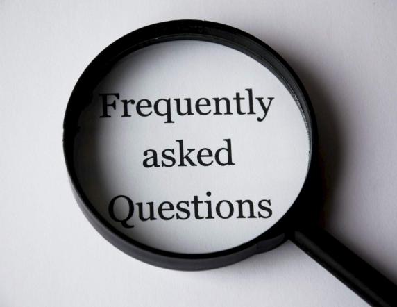 FAQ written inside a magnifying glass