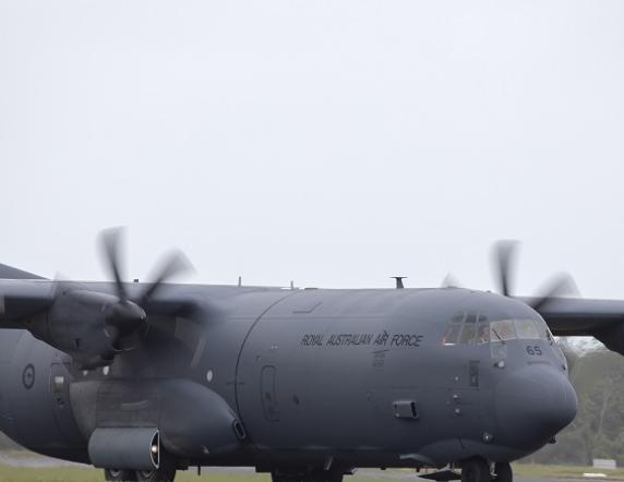 A Royal Australian Air Force C-130J Hercules prepares to take off from RAAF Base Darwin to assist Northern Territory emergency authorities to evacuate up to 600 persons from the Kalkarindji, Pigeon Hole and Daguragu areas.