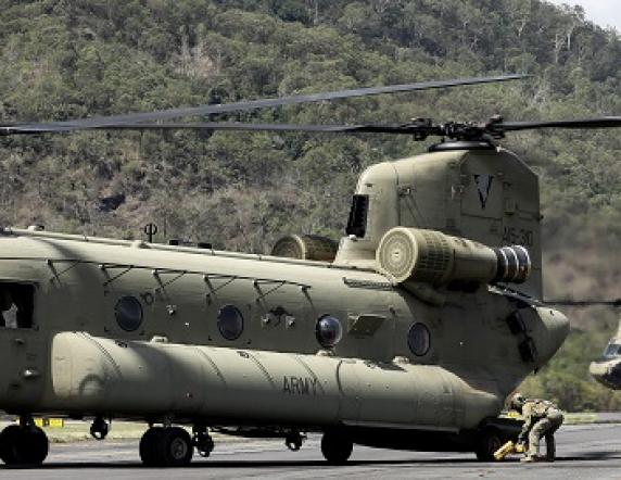 Two Australian Army CH-47 Chinook's prepare to deliver supplies to the flood effected community of Cooktown on 21 December 2023.