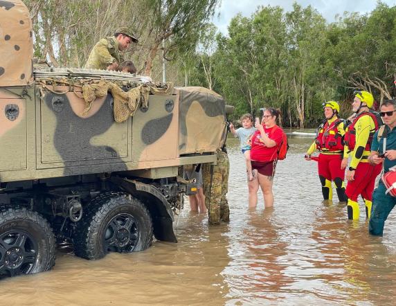 Caption: Soldiers from 51st Battalion, Far North Queensland Regiment assist members of the communities impacted by flooding in Far North Queensland.