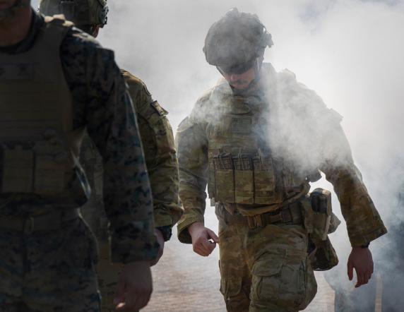 Australian Army Lieutenant Hamish Brown, from the 5th Battalion, Royal Australian Regiment, takes part in an Indigenous smoking ceremony during the opening ceremony of Exercise Southern Jackaroo 21 at 1st Brigade Headquarters, at Robertson Barracks in the Northern Territory on June 15.